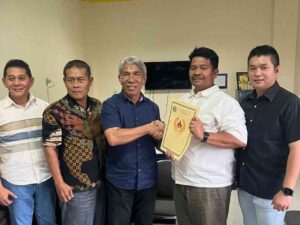 Boster Sitio Terima SK Pengurus KONI Labuhanbatu