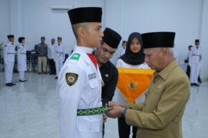 Bupati Surya Kukuhkan Paskibraka Kabupaten Asahan