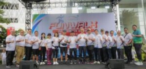 Dukung Inklusi Keuangan 90% di 2024, OJK dan Forkom IJK Sumut Gelar Fan Walk