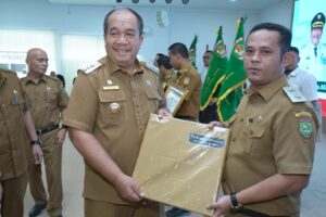 Bupati dan Wabup Asahan Hadiri Penyerahan SPPT PBB-P2
