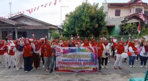 Ratusan Warga Sidorame Barat 1 Jalan Sehat Rayakan HUT RI ke 80