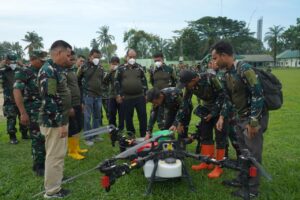 Bupati Asahan Uji Terbang Drone Pertanian di Lahan Pangan Padi Gogo Kodim 0208/AS